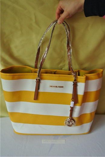 Yellow and white michael kors online bag